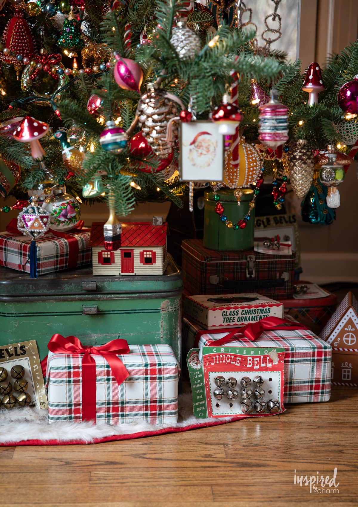 gifts nestled under a christmas tree.