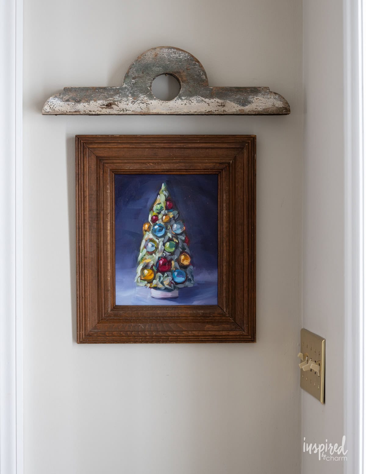 painting of a bottle brush tree in a frame.