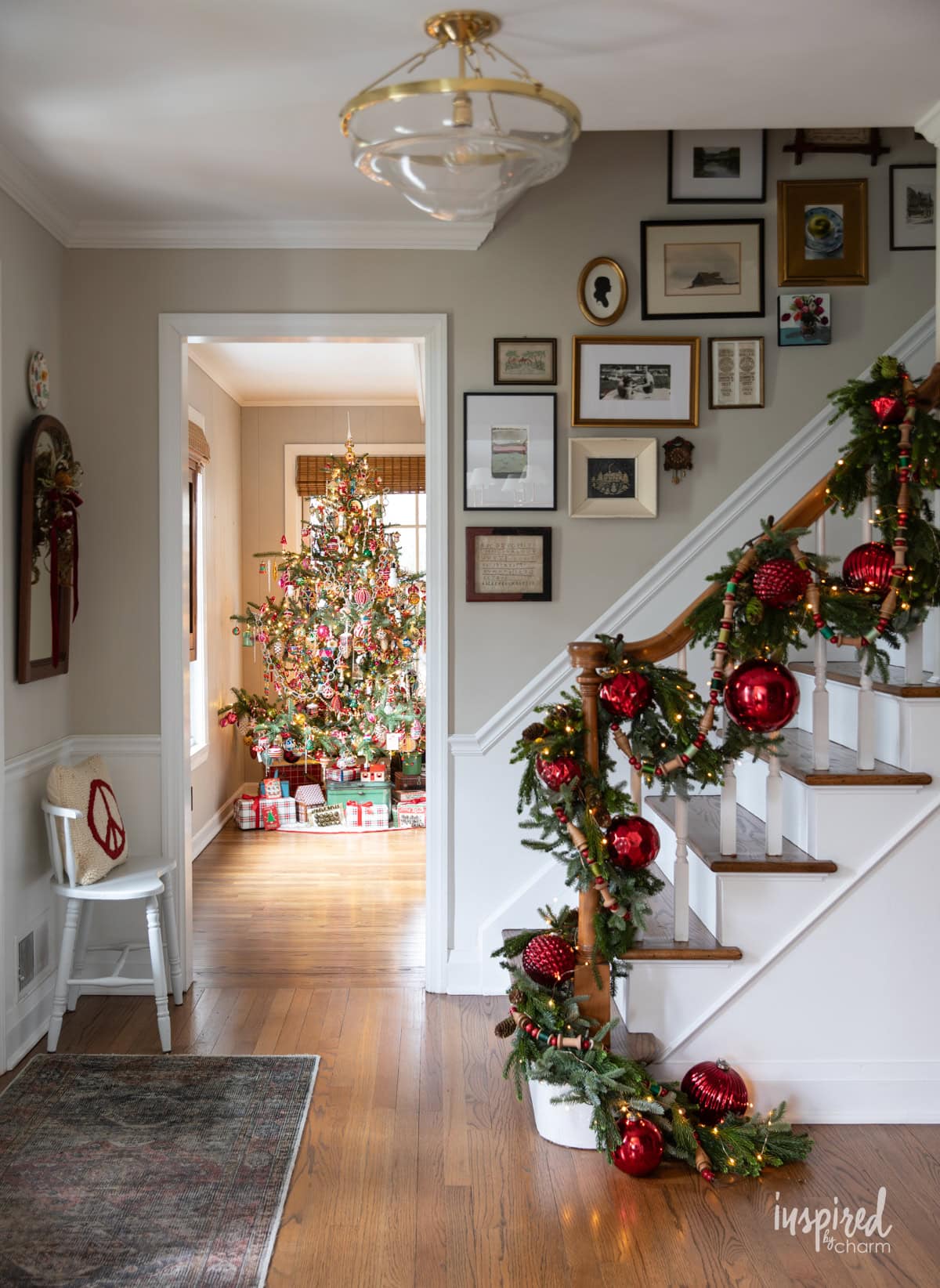 entryway for christmas with vintage inspired tree.