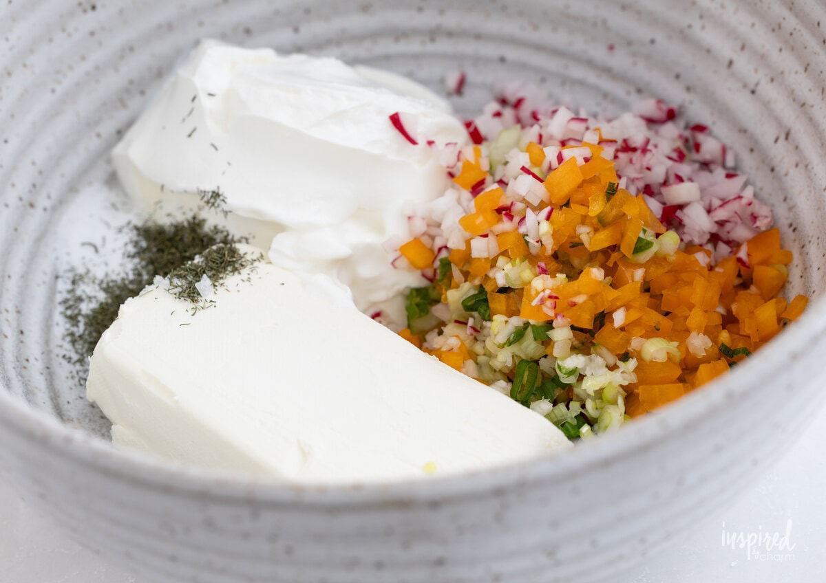 ingredients for creamy garden vegetable dip in a bowl.