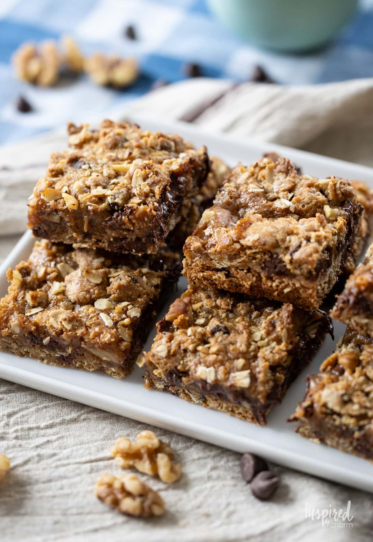 plate stacked with Chocolate Chip Caramel Cookie Bars. 