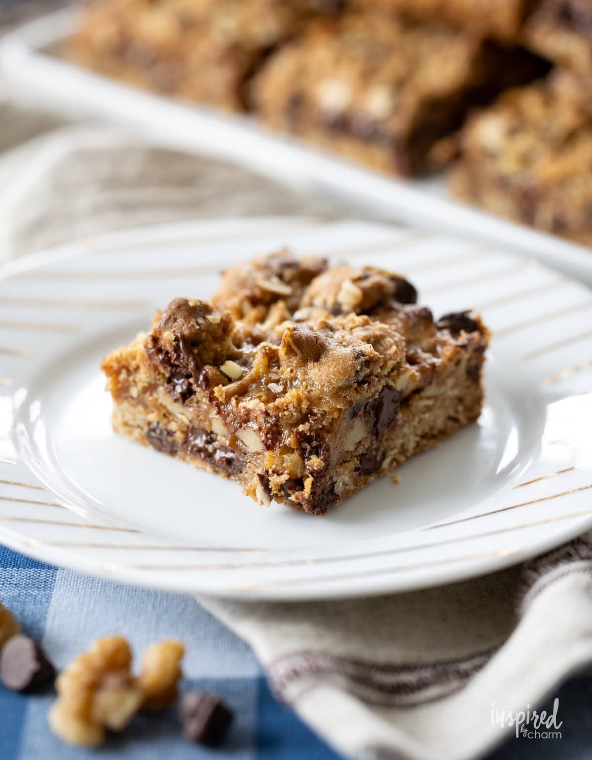 single Chocolate Chip Caramel Cookie Bar on a plate.