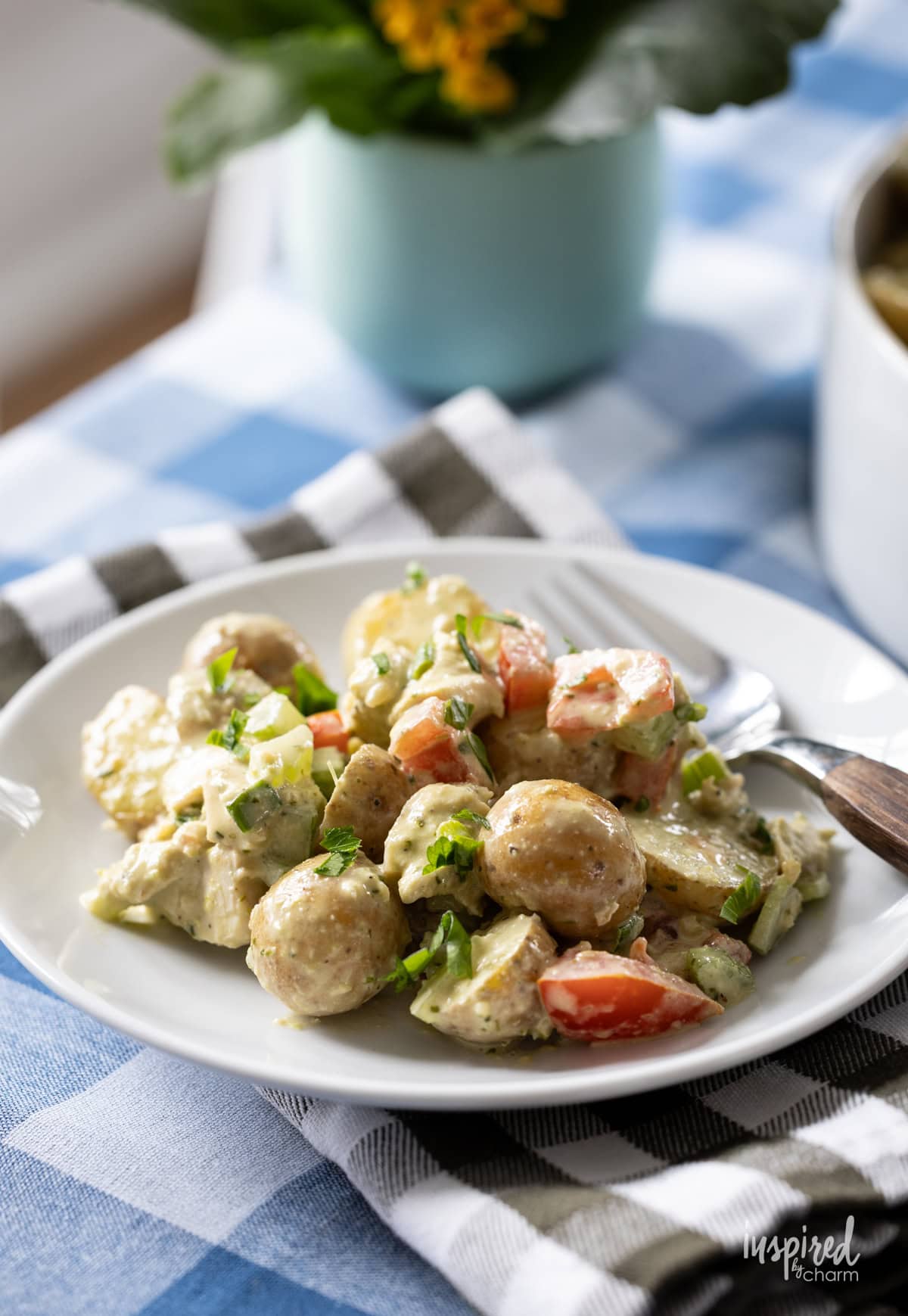 small plate served with Pesto Chicken Potato Salad.