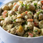 large bowl filled with Pesto Chicken Potato Salad.
