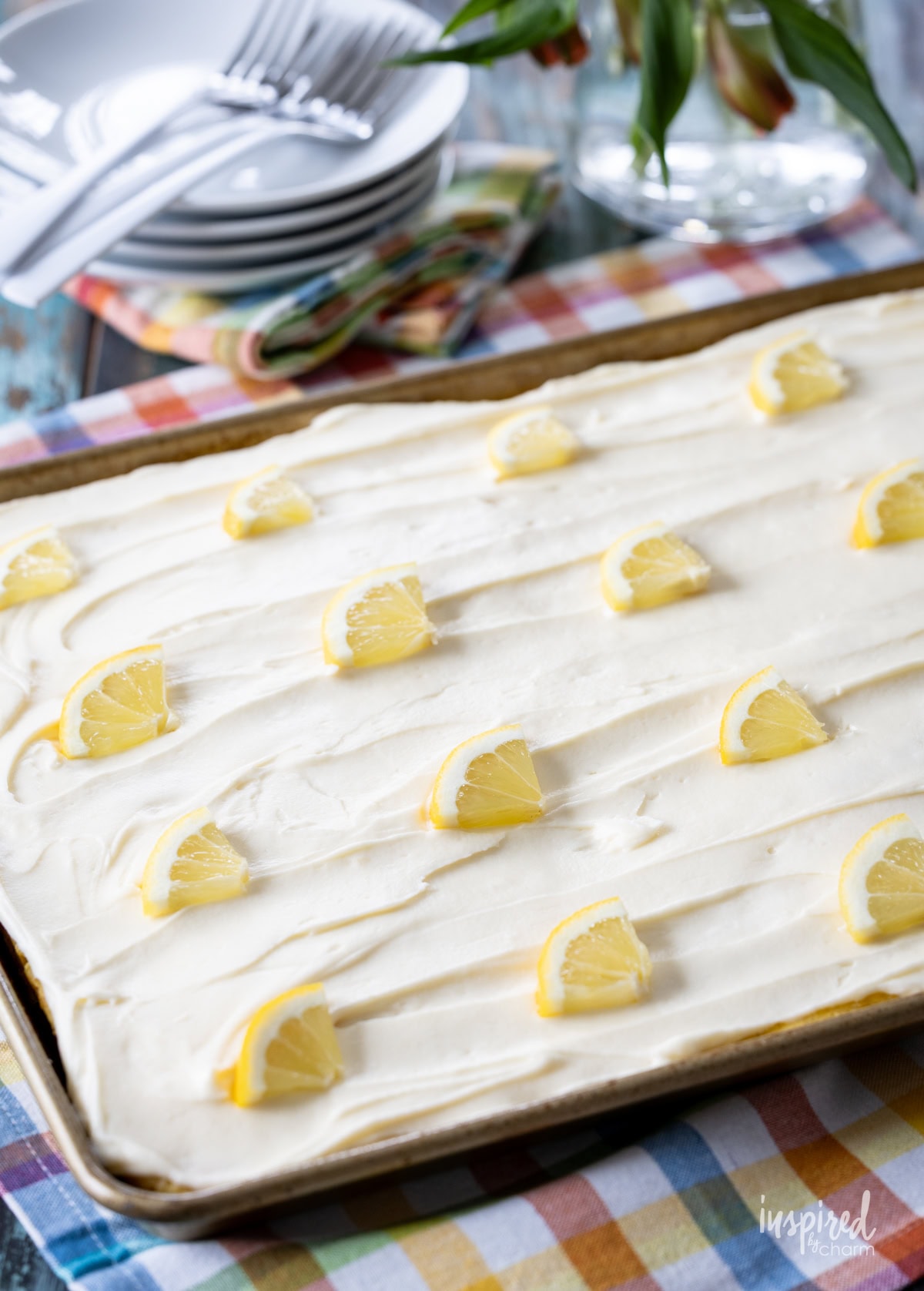 lemon sheet cake in a large sheet pan.