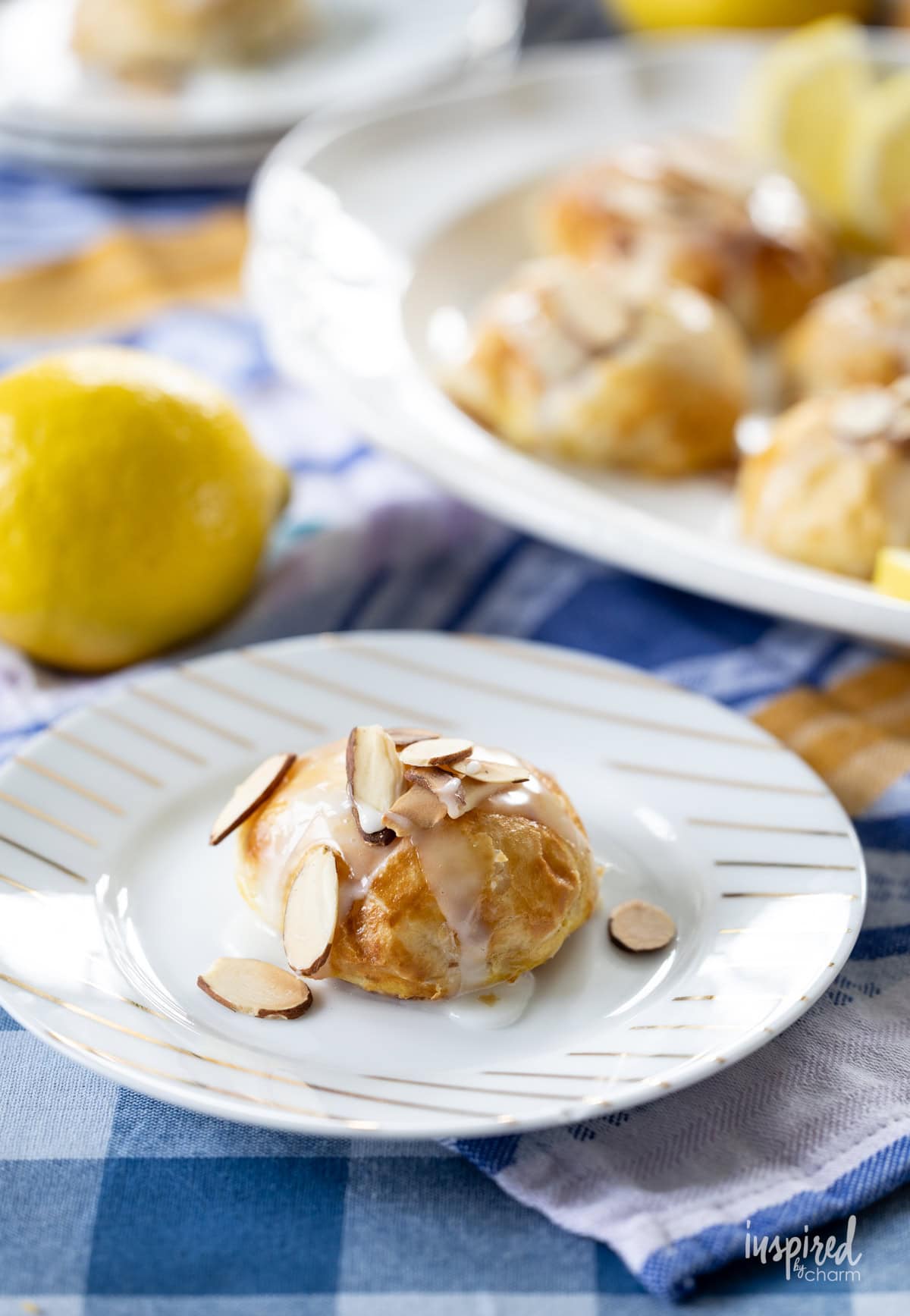 Lemon Almond Cream Cheese Puff Pastry served on a small plate.