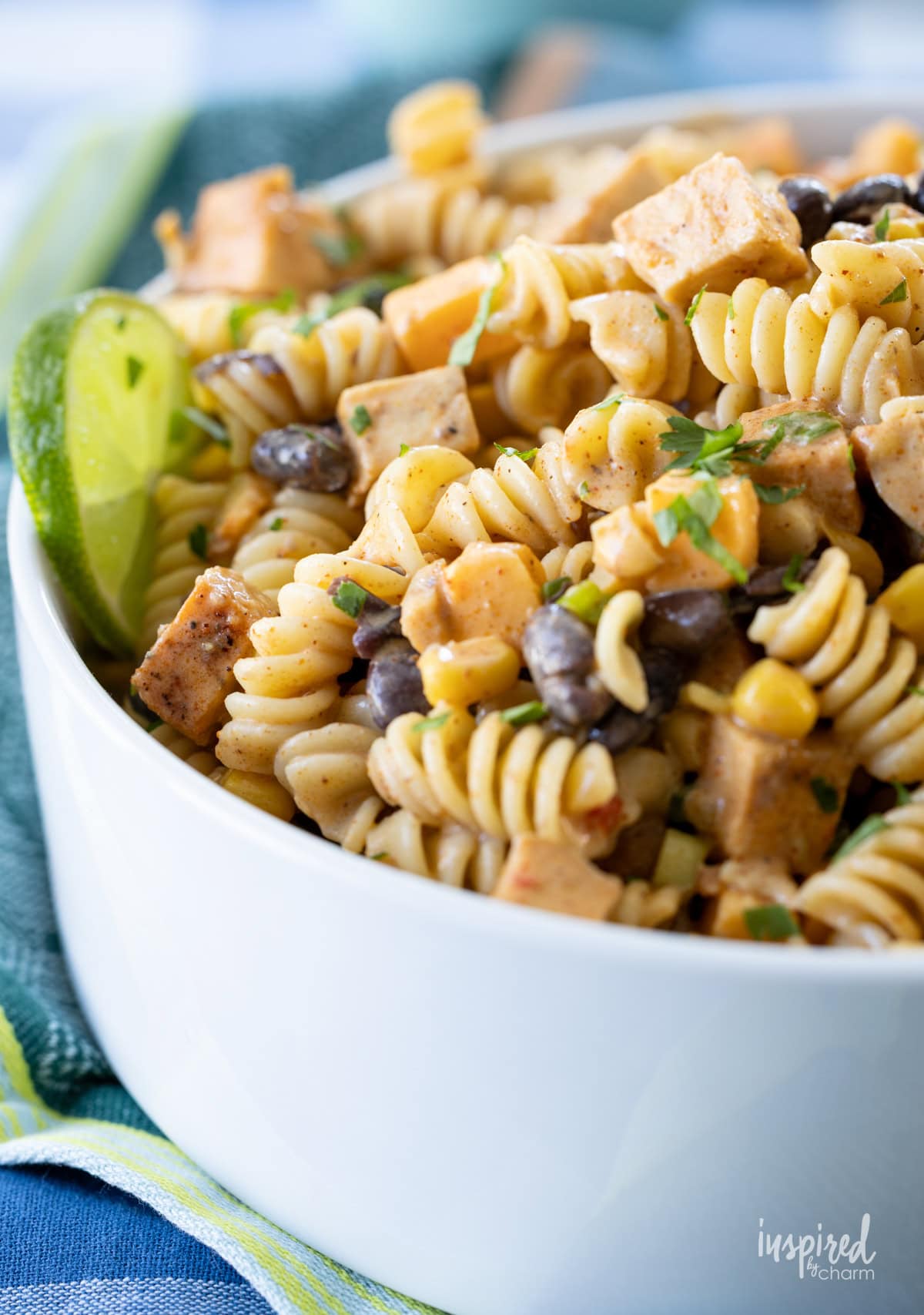 white bowl filled with Southwest Chicken Pasta Salad.