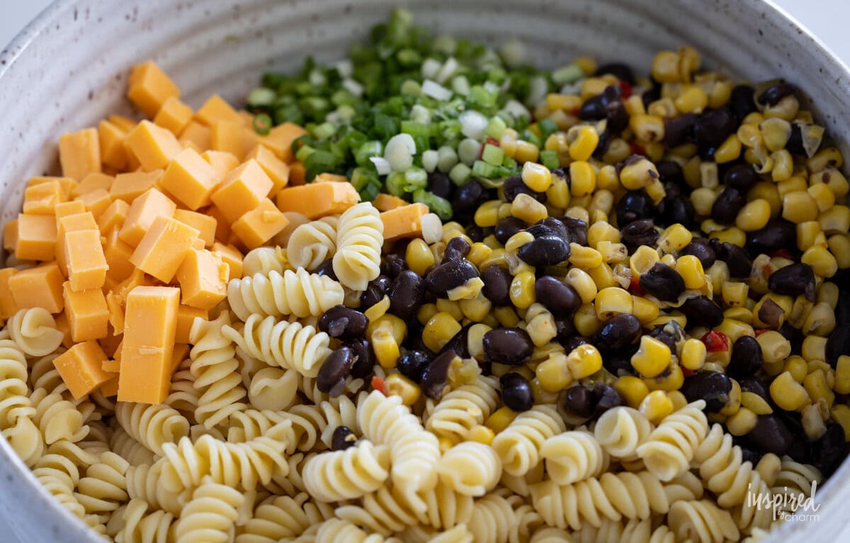 Easy Southwest Chicken Pasta Salad with Creamy Lime Dressing ingredients in a bowl. 