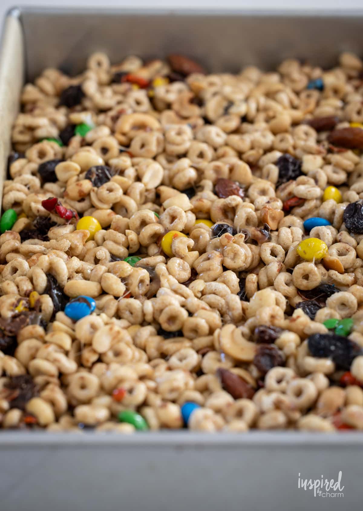 cheerio treat bars in a baking pan.