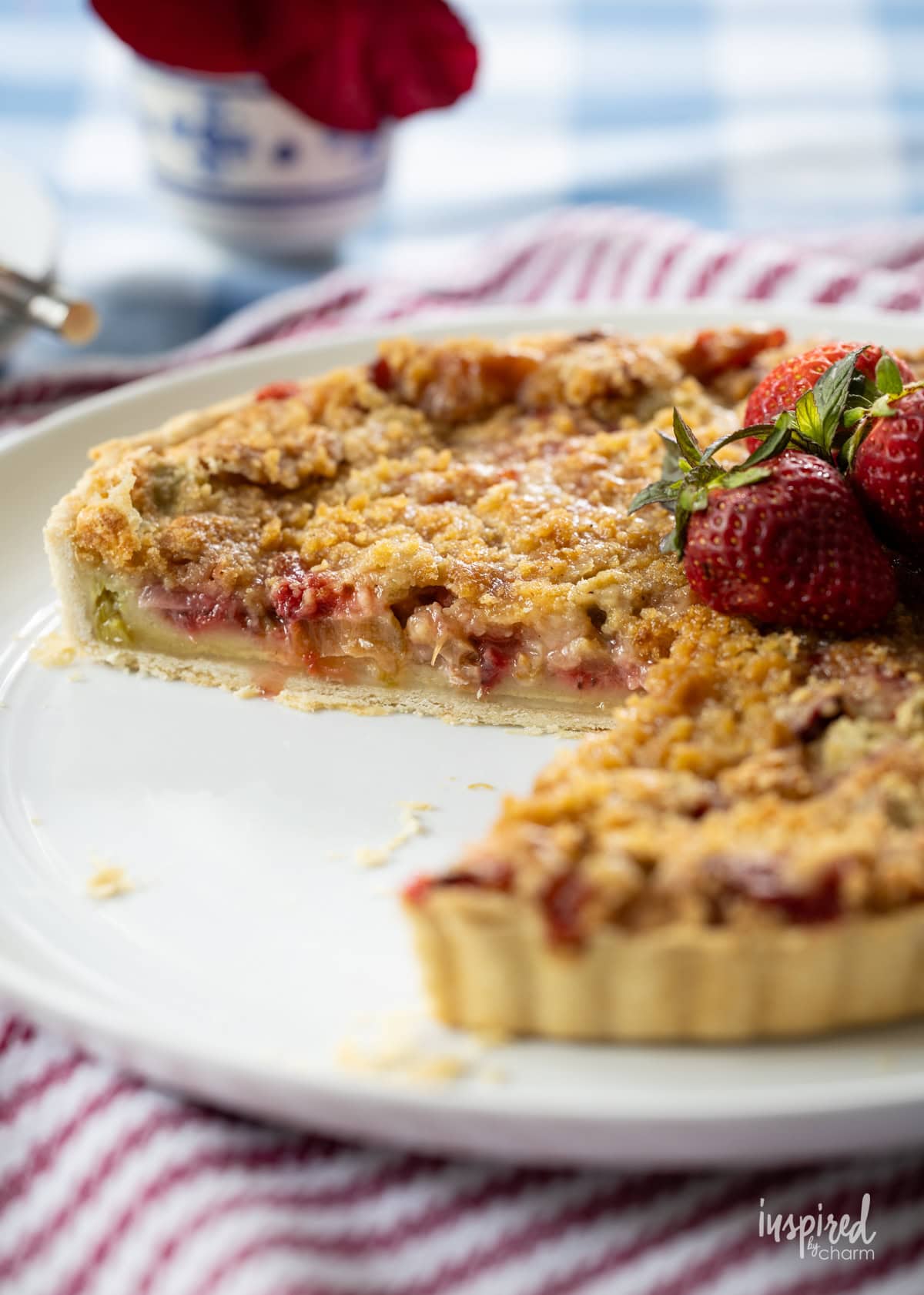 Strawberry Rhubarb Tart with slices removed. 