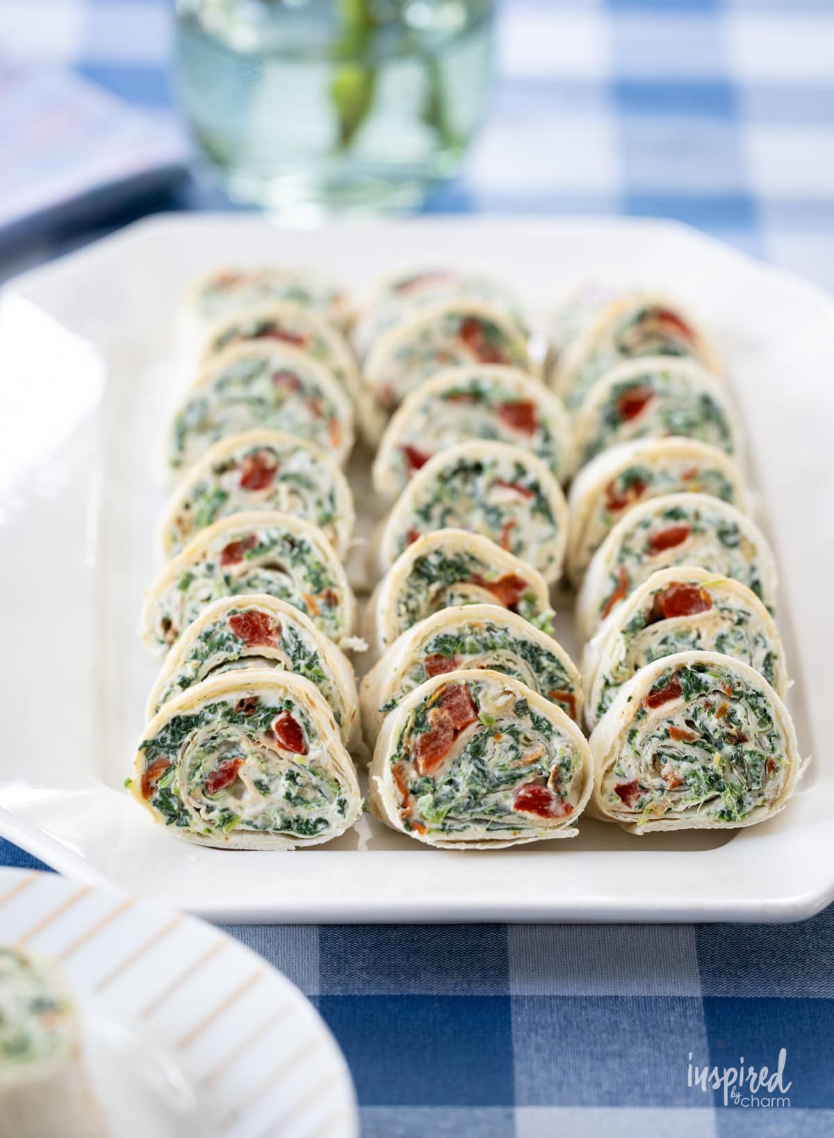 platter of Spinach Dip Roll-Ups on a plate.