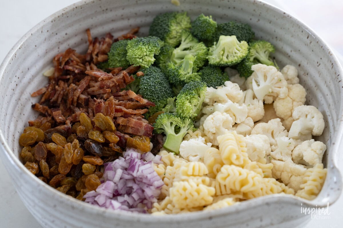 Broccoli Pasta Salad ingredients in a bowl.