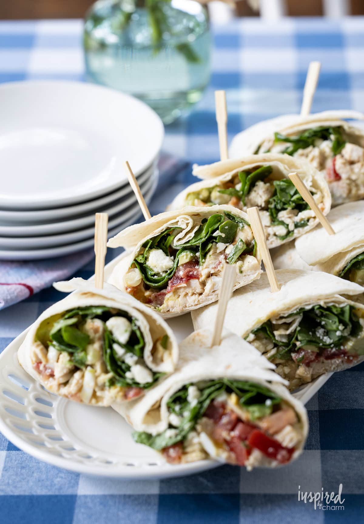 stacks of Cobb Salad Wraps on a large oval platter.