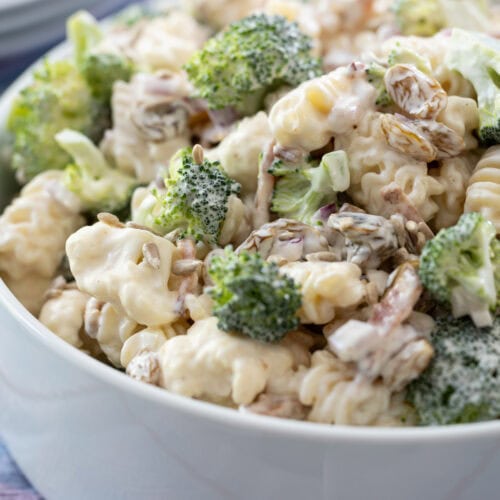 white bowl filled with Broccoli Pasta Salad.