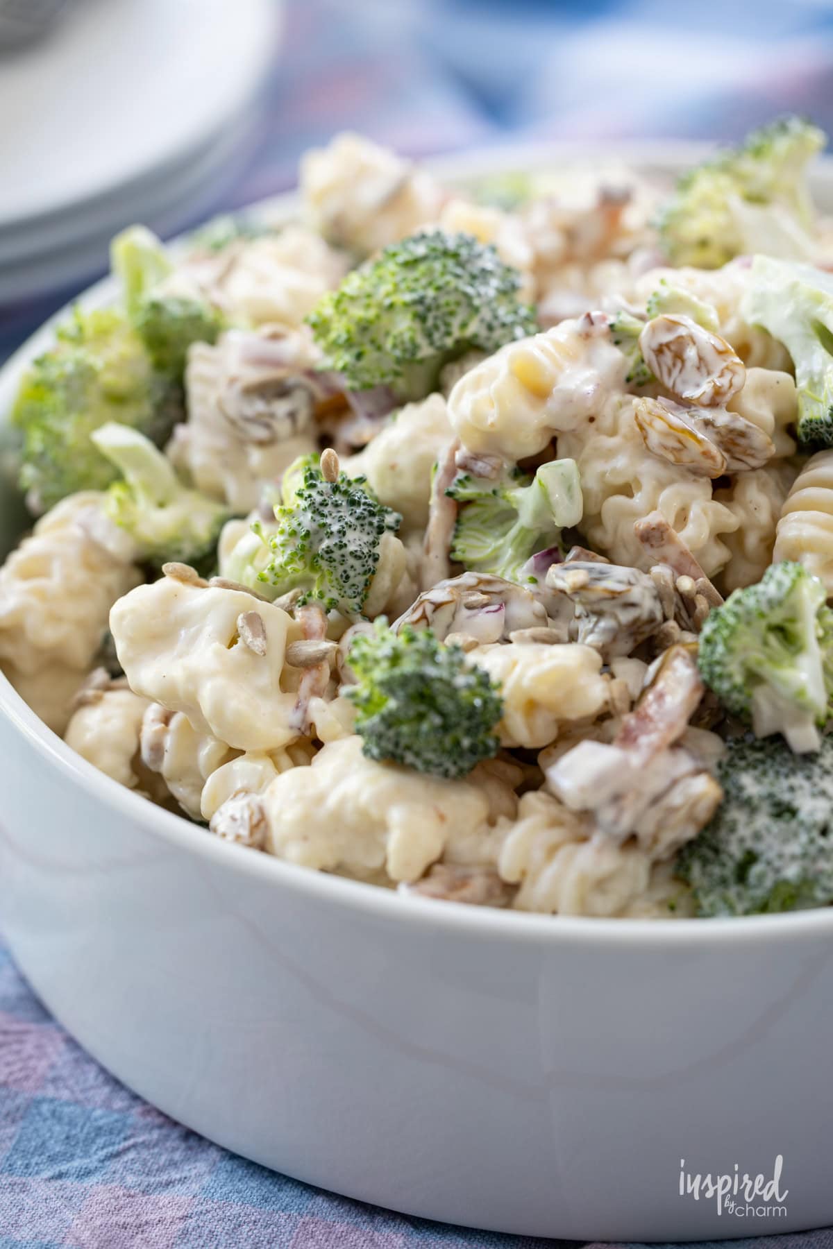 white bowl filled with Broccoli Pasta Salad.