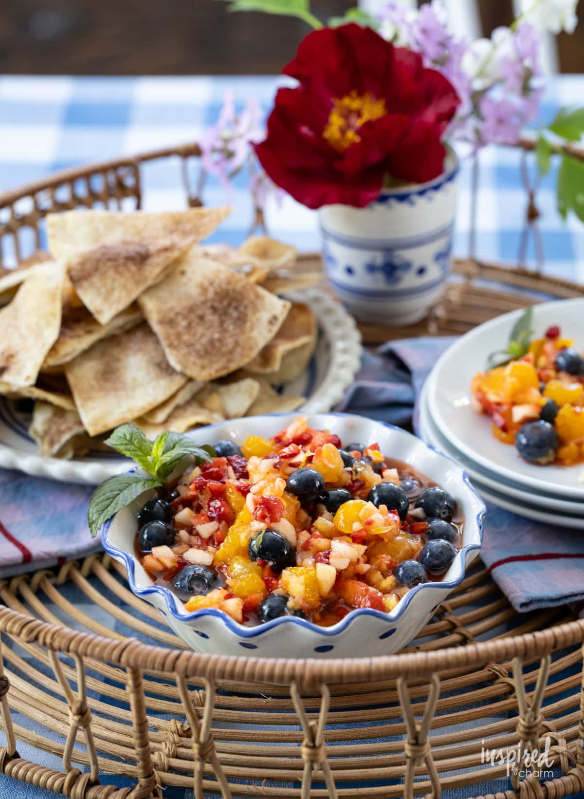 fruit salsa spread with tortilla chips in a bowls.