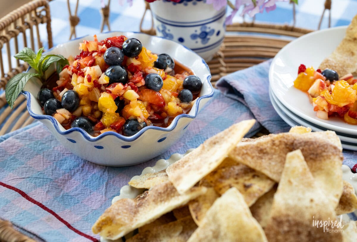 fruit salsa in a bowl with cinnamon tortilla chips.