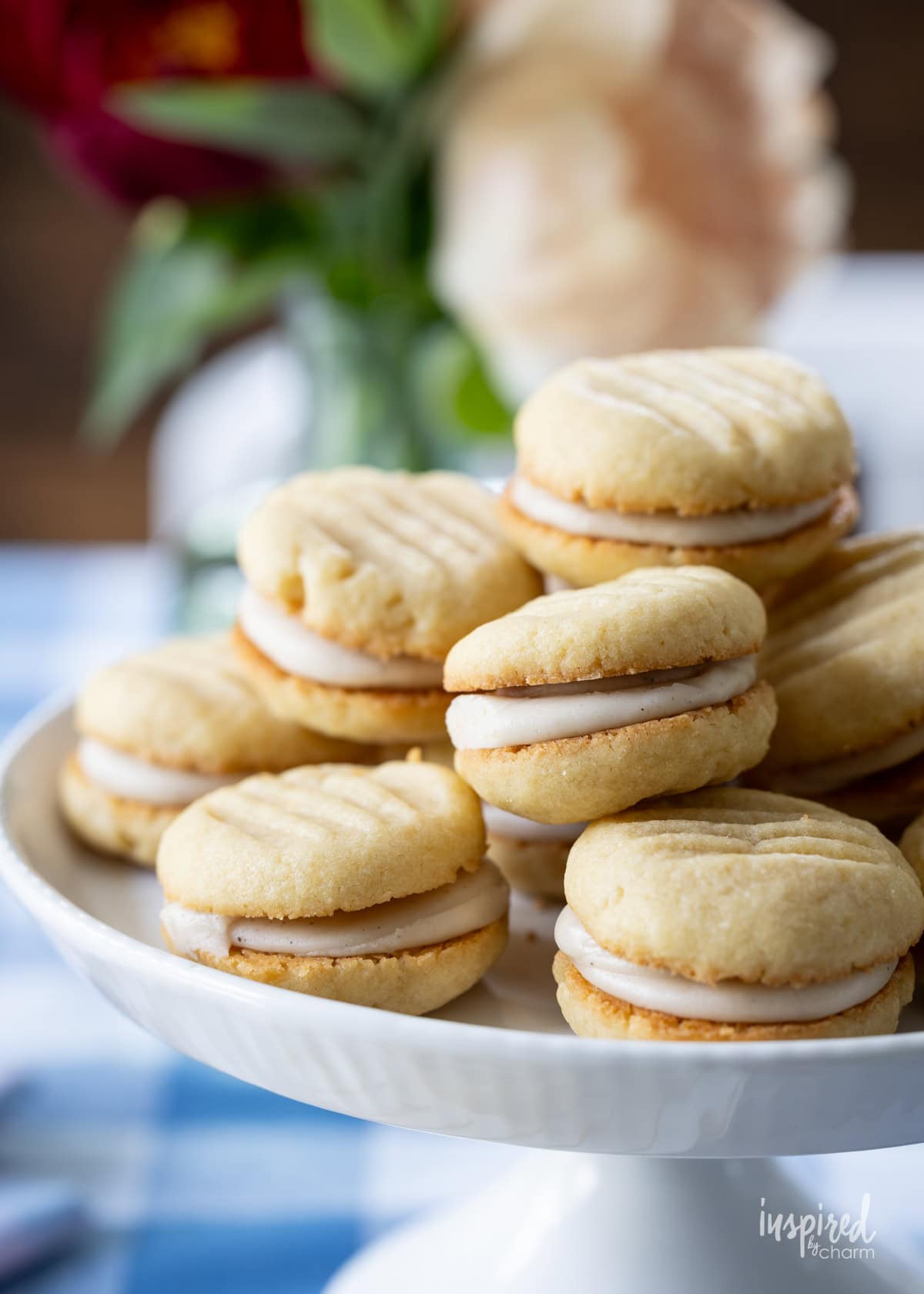 cake stand stacked with Brown Sugar Cream Sandwich Cookies.