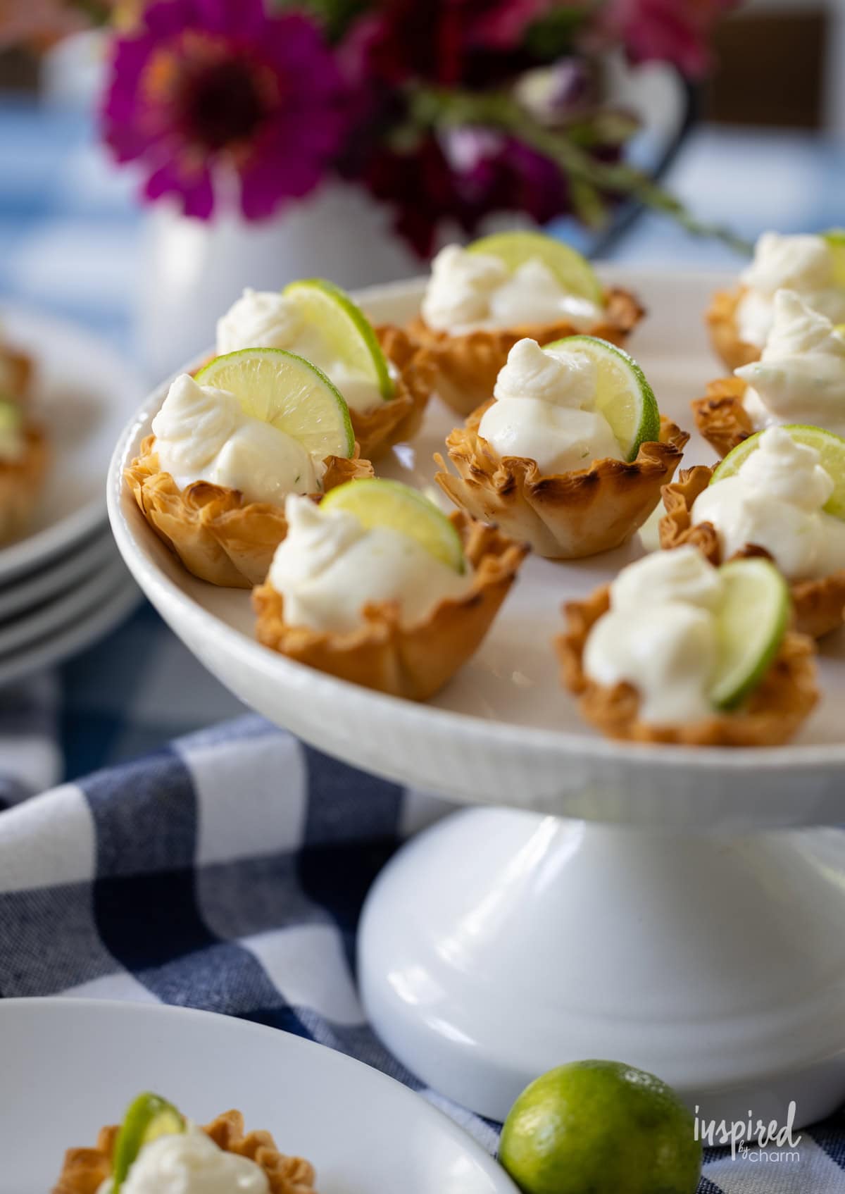 cake stand filled with Key Lime Pie Tartlets. 