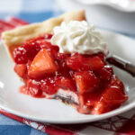 slice of Black Bottom Strawberry Pie on a plate.