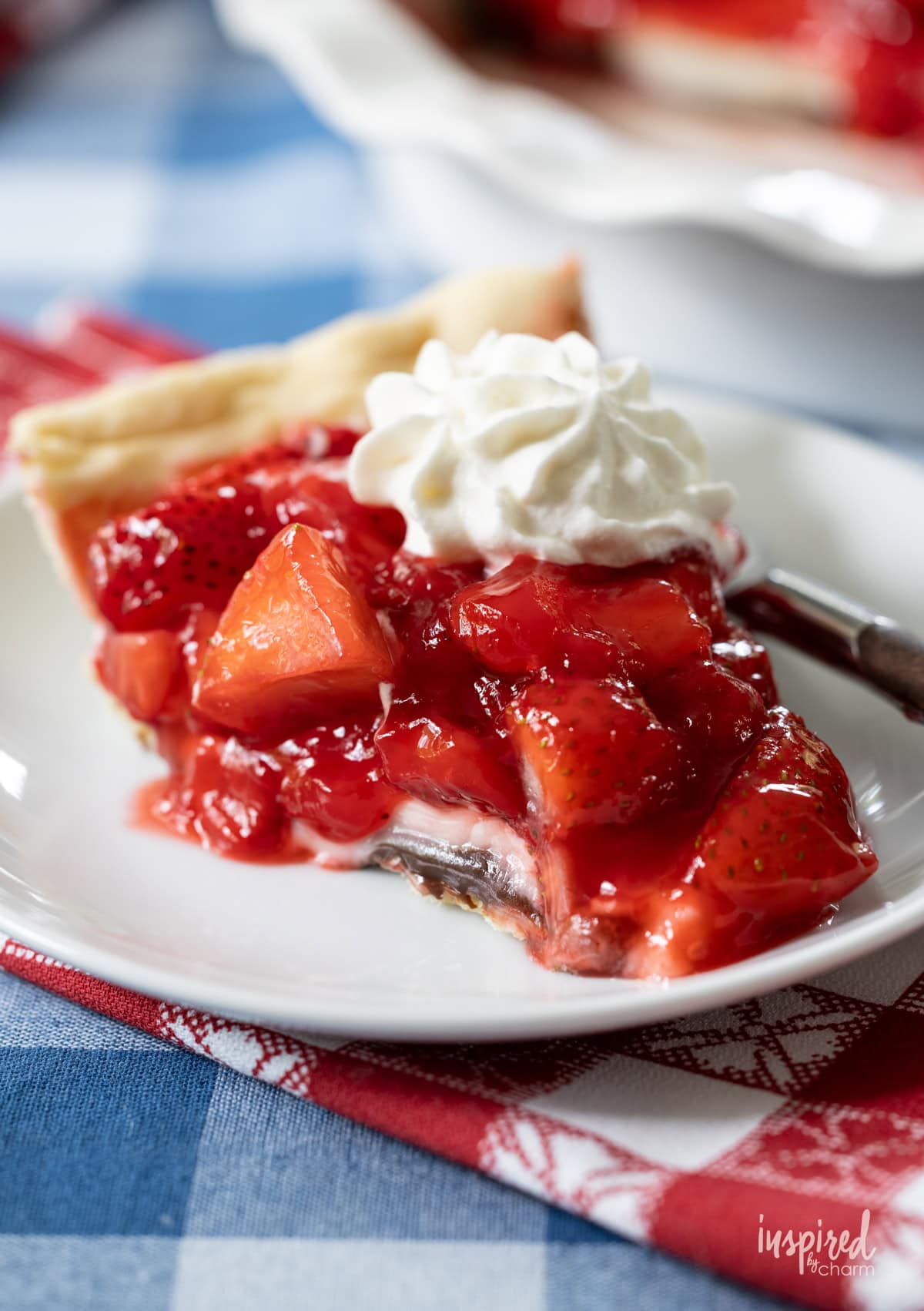 slice of Black Bottom Strawberry Pie on a plate. 