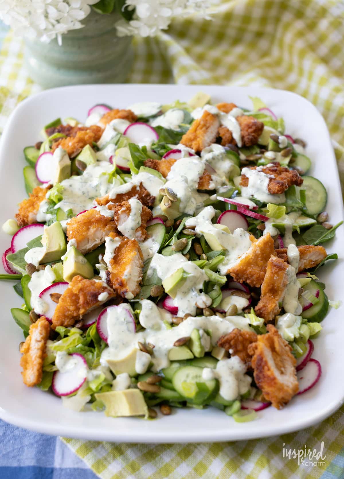 Crispy Chicken Green Goddess Garden Salad on white platter.