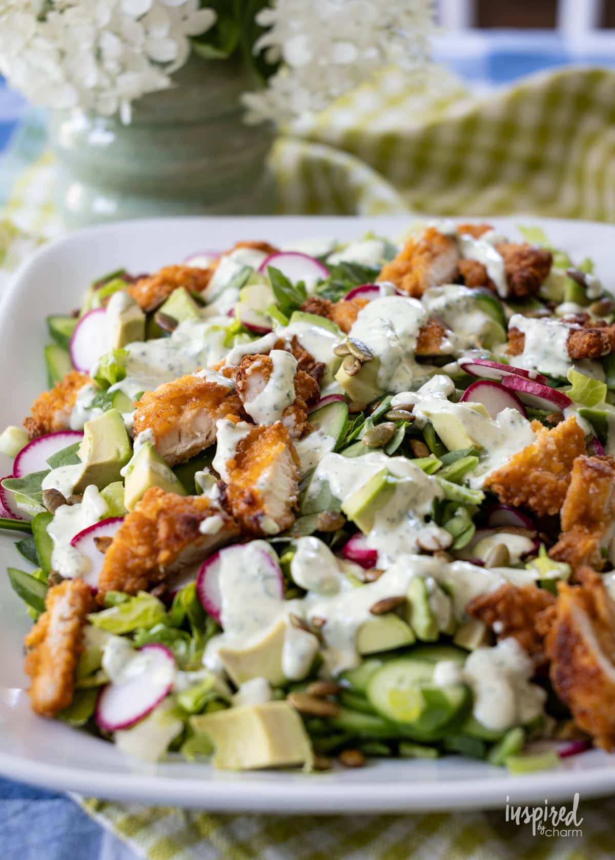 platter filled with Crispy Chicken Green Goddess Garden Salad.
