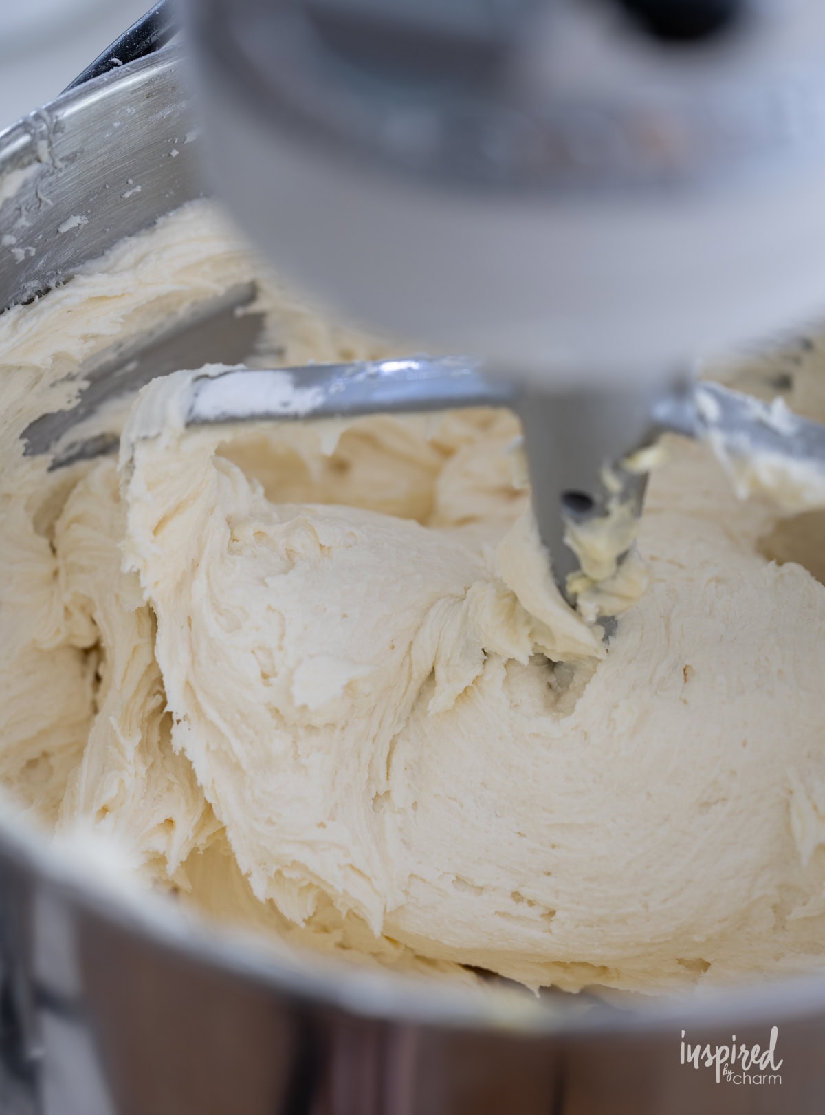 whipped frosting in a mixing bowl.