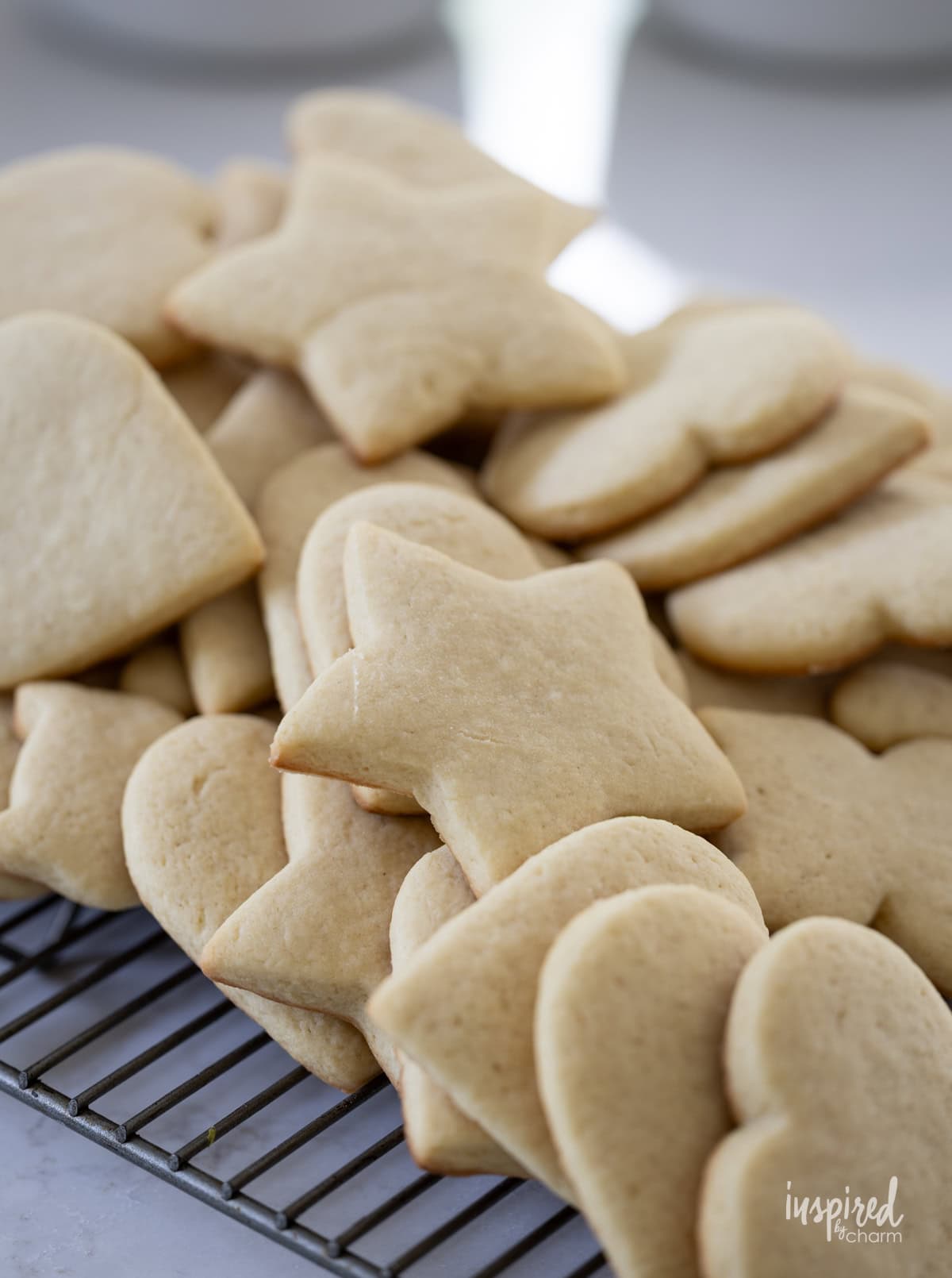 baked cut out cookie on a cooling rack.