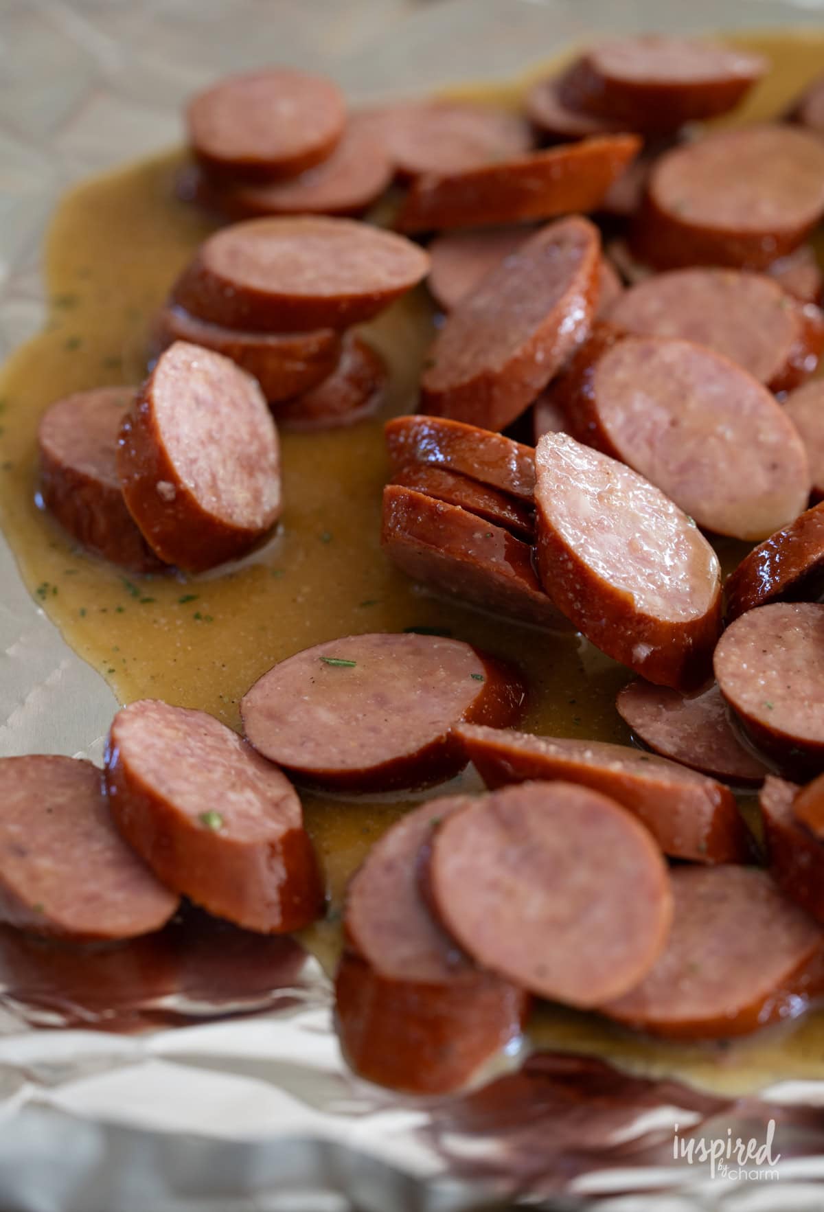 maple dijon sausage bites on a baking sheet.